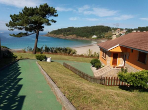 Chalet en Sanxenxo, encima de la playa Canelas